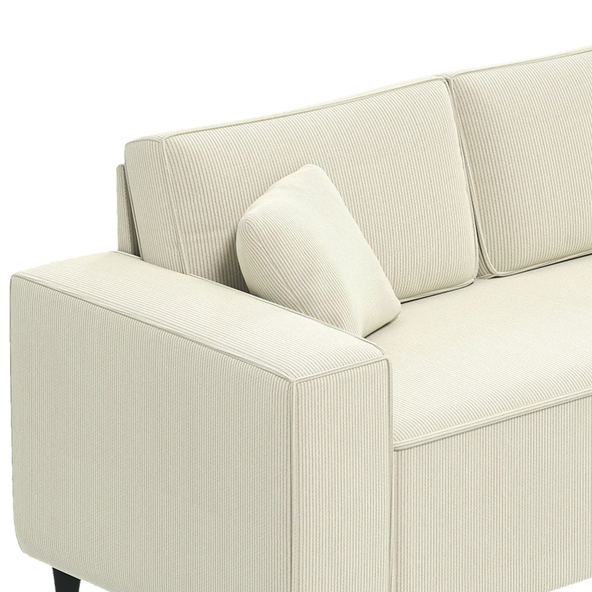 Détail du velours côtelé crème et d'un coussin d'Ambre