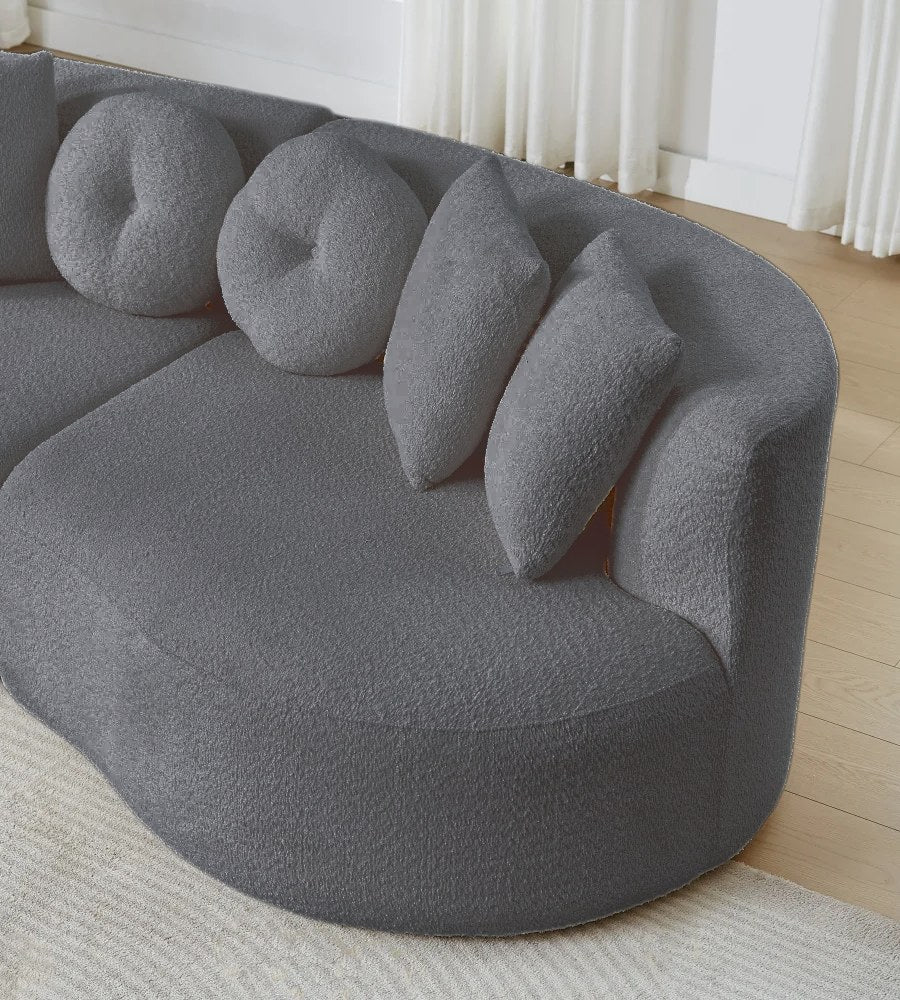 Détail de l'assise arrondie et des coussins ronds d'Éclipse Gris ardoise