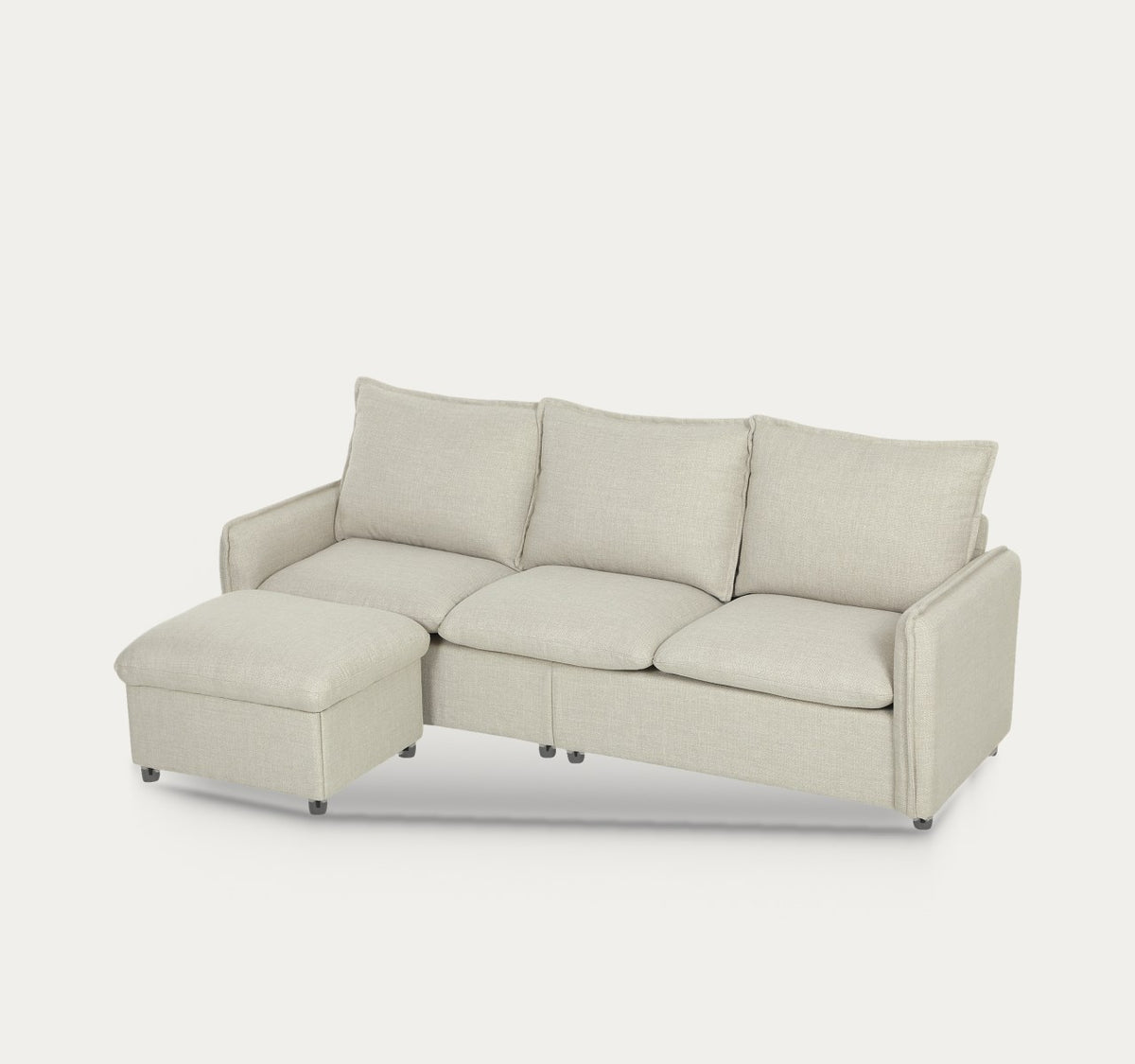 Cocon en Blanc crème vue de trois quarts, pouf à gauche, sur fond clair